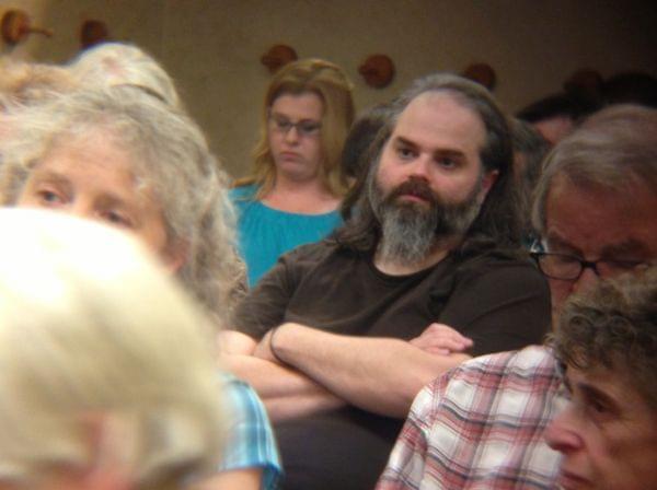 Brian Robertson, an acquisition cataloging clerk at the Urbana Free Library, at Tuesday night's public meeting.