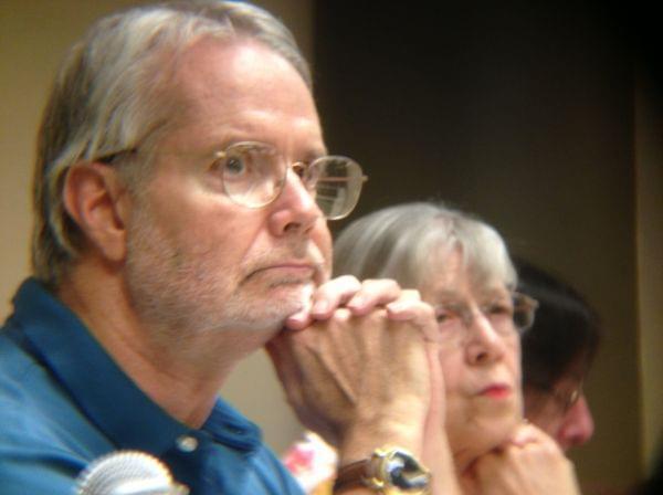 Urbana Free Library Board member Mark Netter listens to public comment during the board meeting on Tuesday night.