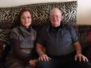 Heagin and Roger Burton sitting together on a couch