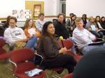 An audience member comments during the discussion after watching We Still Live Here