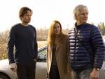  David Duchovny (Fox Mulder) and Gillian Anderson (Dana Scully) on set of the X-Files with creator Chris Carter.