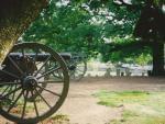 Cannons at Gettysburg with grave markers in background