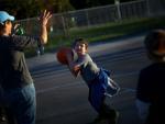 Kid playing basketball