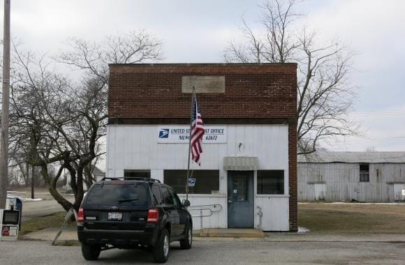 The post office in Nilwood, Ill., serves as an informal community center.