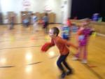 student at Wiley Elementary running during gym class