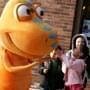 Buddy the Dinosaur from Dinosaur Train with children at Parkland Planetarium.