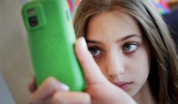 Girl with mobile device