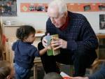 George Willhite reading to toddlers