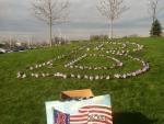 Mile six of the Illinois Marathon included a tribute to the Boston marathon bombing victims.