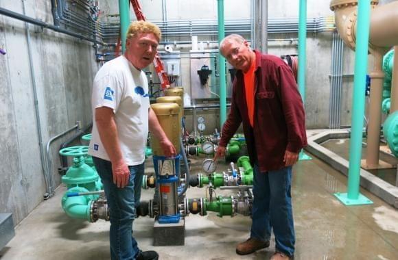 Staunton, Ill., Mayor Craig Neuhaus (left) checks out the town’s new water plant with Hank Fey, a public works director.