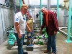 Staunton, Ill., Mayor Craig Neuhaus (left) checks out the town&rsquo;s new water plant with Hank Fey, a public works director. 