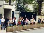 Poles line up in front of the Visa Section of the U.S. Embassy in Warsaw, Poland, Tuesday, Aug. 14, 2007. 