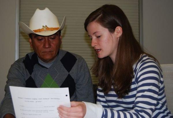 A Google employee tutors one of the company's janitors in a weekly English class.