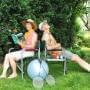 a couple sits in their backyard