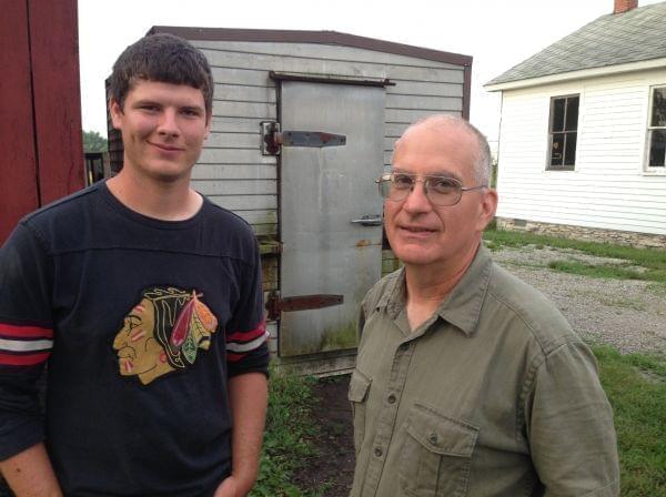 Marty Travis, right, started the Stewards of the Land food hub in 2005. His son Will, left, helps him transport food from local farms to area restaurants.