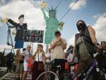 Supporters of U.S. Army Pfc. Bradley Manning protest his detention by marching around the perimeter and blocking the gates of Fort McNair in Washington, D.C., on the final day of closing arguments in his military trial Friday.