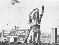 archival picture of Chief Illiniwek dancing