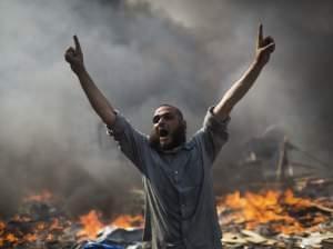A supporter of ousted Islamist President Mohammed Morsi shouts during clashes with Egyptian security forces in Egypt
