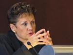 In this Tuesday, Sept. 10, 2013 file photo, Illinois Supreme Court Justice Rita R. Garman questions an attorney during oral arguments in Chicago.