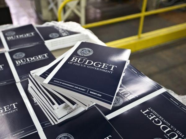 Copies of President Obama's proposed budget plan for fiscal year 2014 are prepared for delivery at the U.S. Government Printing Office in Washington in April 2013.
