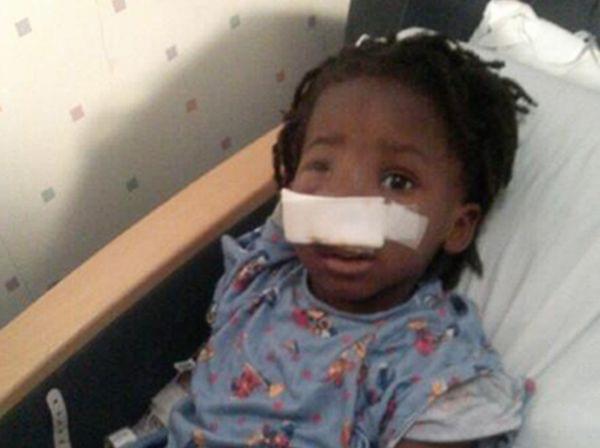 A family photo provided by the Rev. Corey Brooks shows 3-year-old Deonta Howard recovering from a gunshot wound Monday at Mount Sinai Hospital in Chicago.