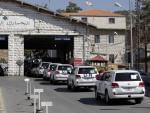 A convoy of inspectors from the Organization for the Prohibition of Chemical Weapons crosses into Syria at the Lebanese border crossing point of Masnaa on Tuesday.