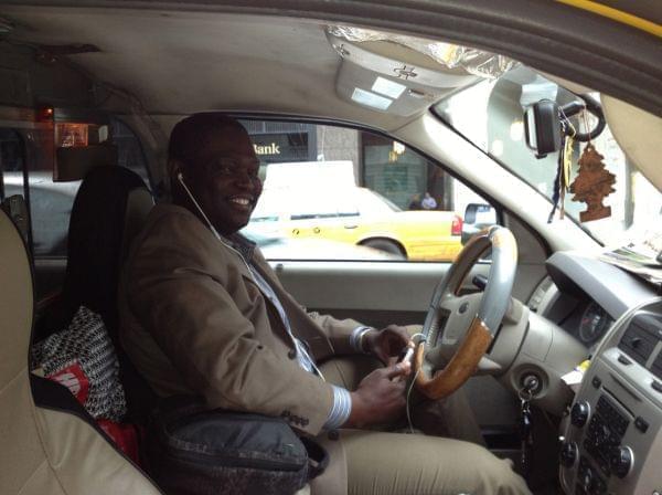 Boubacar Sanogo from Mali drives a cab in New York City and listens to ZenoRadio on his smartphone — though it can also be accessed using a more basic model.