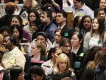 Job seekers attend a March health care job fair in New York.