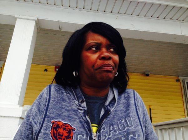 Damita Parsley, 51, stands outside her temporary residence with the Center for Women in Transition in Champaign, Ill. on Jan. 16, 2013.