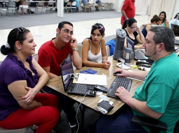 Signup for health insurance at a Miami mall March 20.