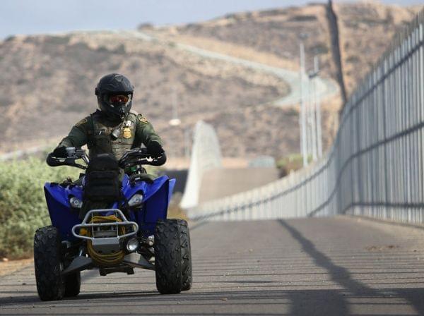A new report lists more than 800 complaints made against U.S. Border Patrol agents; most include physical abuse. Here, an agent patrols the U.S.-Mexico border fence at in San Diego, Calif., last year.