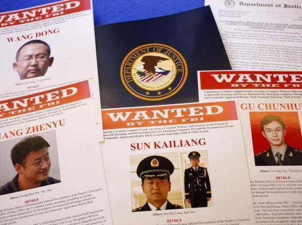 Press materials are displayed on a table of the Justice Department in Washington on Monday, before Attorney General Eric Holder was to speak at a news conference.
