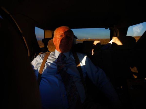 John Huckleberry sits in the back seat of a friend's car on the way back from visiting inmates at Sterling Correctional Facility. After 30 years in prison, Huckleberry — who was released in 2012 — helps aging inmates prepare for life