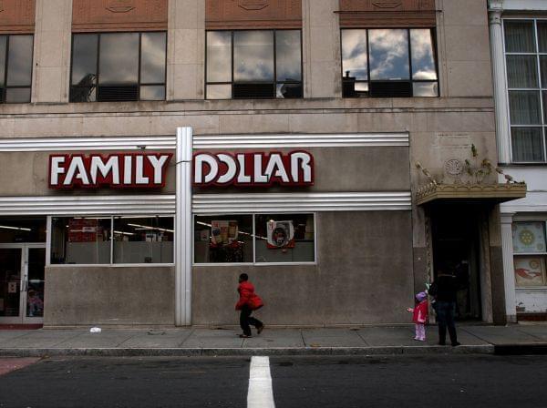 People shop outside of a Family Dollar discount store in Waterbury, Connecticut.