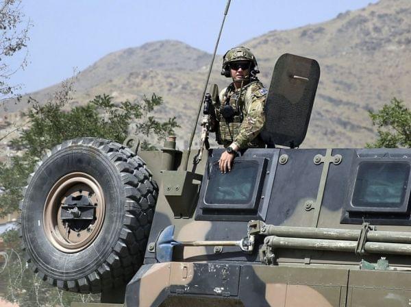 NATO soldier keeps watch near Kabul Tuesday.