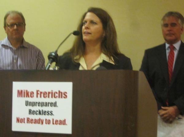 Backers of Rep. Tom Cross hold press conference in Champaign.