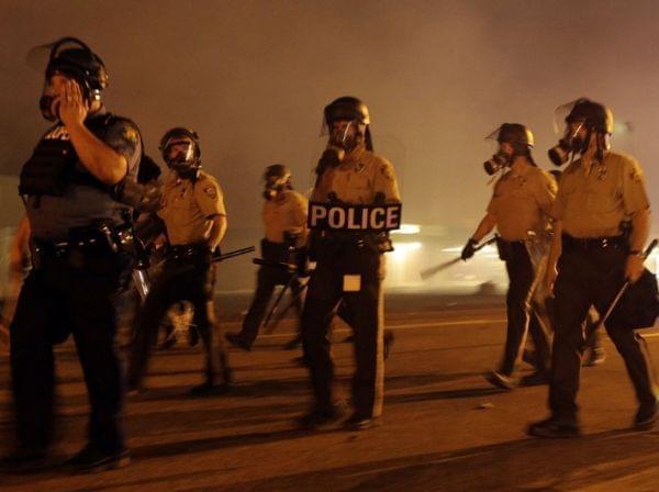 Police fire tear gas in Ferguson