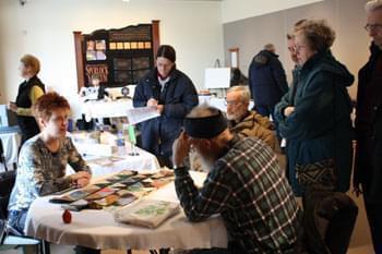 Christa Deacy-Quinn talks with visitors