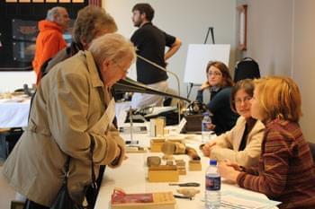 Laura Kuzoch speaks with visitors