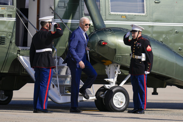 President Joe Biden steps off Marine One before boarding Air Force One at Andrews Air Force Base, Md., Thursday, Nov. 9, 2023, en route to Illinois.