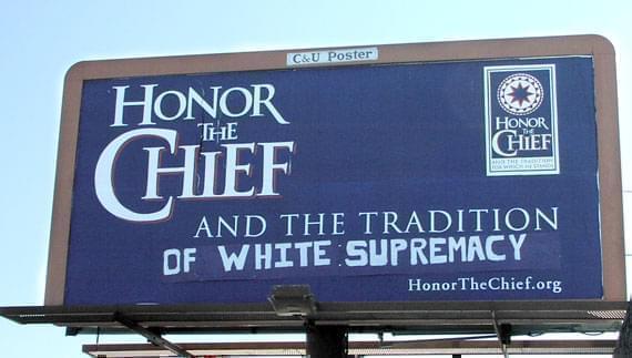 Honor the Chief billboard, vandalized by anti-chief activitists