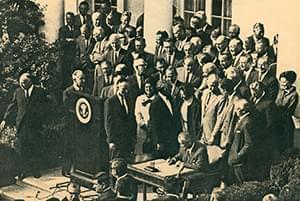 President Johnson signing the 1965 law that created the NEH