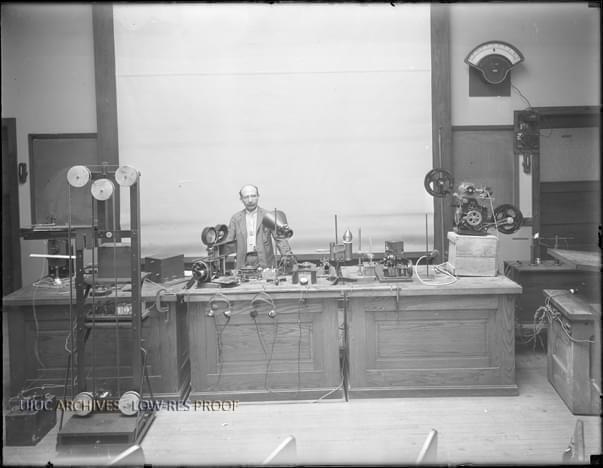 June 9, 1922: Joseph Tykociner, University of Illinois Professor of Electrical Engineering, photographed with equipment used to demonstrate his groundbreaking synchronous sound and motion picture film. (Courtesy of the University of Illinois Archives)
