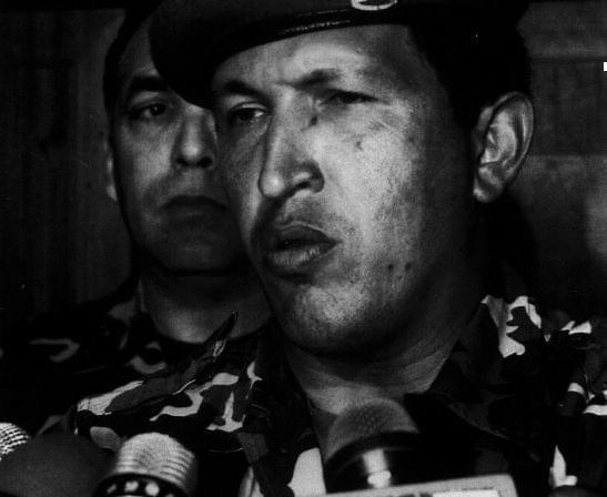 As a lieutenant colonel in 1992, Chávez led a failed attempt to oust President Carlos Andres Perez. Here he talks to reporters at the Defense Ministry after he surrendered to troops loyal to the president.