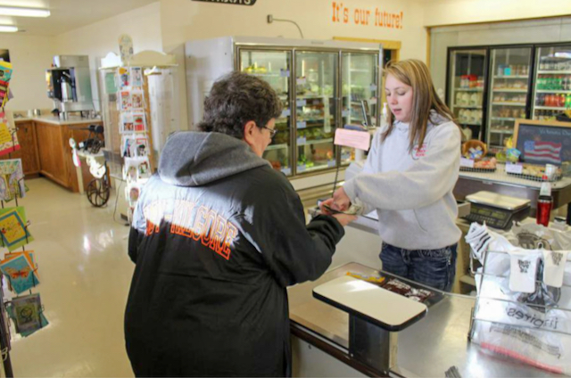 Students help run the Circle C Market in rural Cody, Nebraska, as part of classwork. As rural areas struggle to keep traditional grocery stores, some communities are finding other solutions.