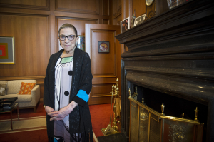 In this July 31, 2014, file photo, Associate Justice Ruth Bader Ginsburg is seen in her chambers in at the Supreme Court in Washington. The Supreme Court says Ginsburg has died of metastatic pancreatic cancer at age 87.