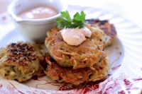 This Oct. 26, 2015 photo shows latkes with chipotle sour cream in Concord, NH. These crispy little potato pancakes make a wonderful appetizer or a great side dish all year long.