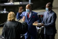 Illinois State Rep. Emanuel "Chris" Welch, D-Hillside, takes the Oath of Office to become the Illinois Speaker of the House for the 102nd General Assembly for the Illinois House of Representatives at the Bank of Springfield Center, Wednesday, Jan. 13, 2021, in Springfield.