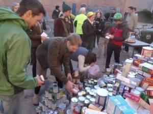volunteers collecting food for people who need it