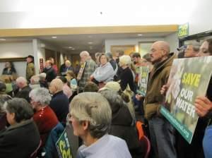 Opponents of the proposed coal mine in Homer gather at Monday night's village board meeting.